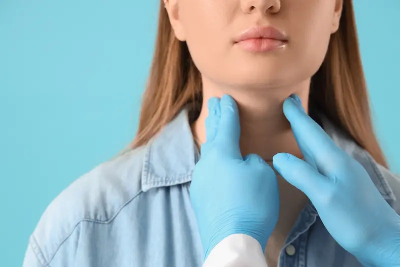 Thyroid disorder examination by a doctor