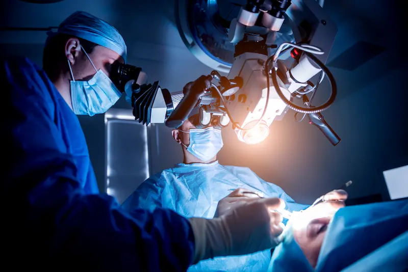 Surgeon Performing Brain Tumor Removal Operation